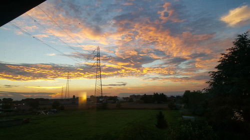 Scenic view of landscape at sunset