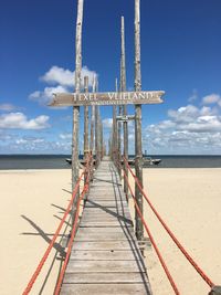 Pier over sea against sky