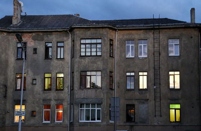 Students' homes with lights in early evening