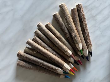 High angle view of colored pencils on table