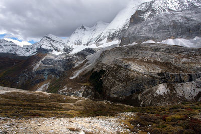 Scenic view of snowcapped mountains against sky