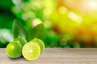 Close-up of green fruits on table