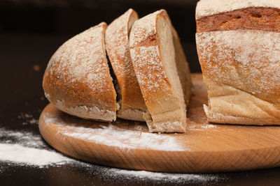 Close-up of bread on cutting board