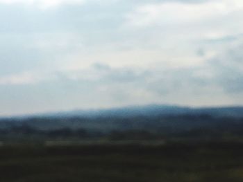 Close-up of landscape against sky