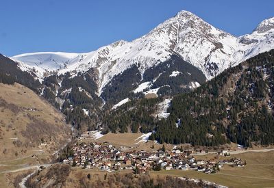 Scenic view of snowcapped mountains against sky