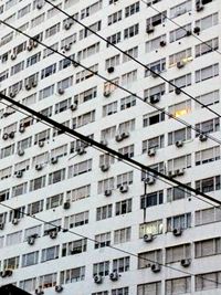 Massive building with rows of windows 