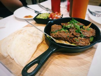 High angle view of food served on table