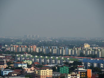 High angle view of buildings against sky in city