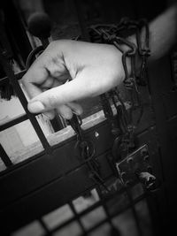 Close-up of man holding hands