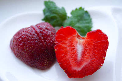 Close-up of strawberries in plate on table