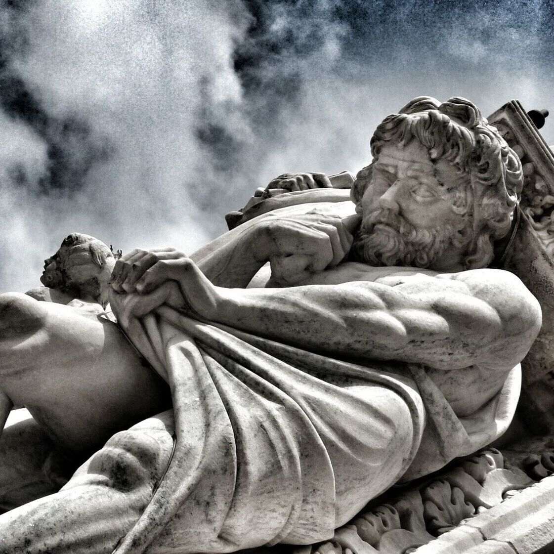 sky, cloud - sky, cloudy, statue, sculpture, art and craft, art, cloud, human representation, low angle view, tranquility, rock - object, no people, creativity, rock formation, nature, outdoors, weather, day