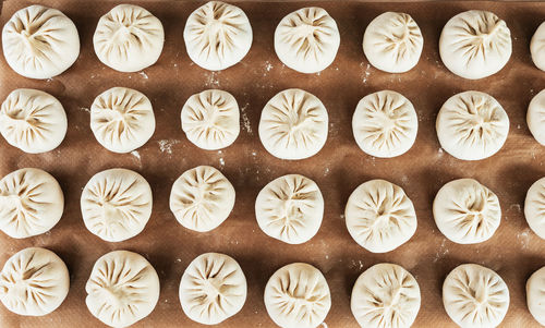 Full frame shot of bao on a table. bao, also called baozi. it's a traditional chinese food. 