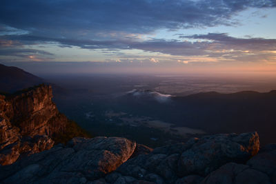 Scenic view of mountains against sky during sunset