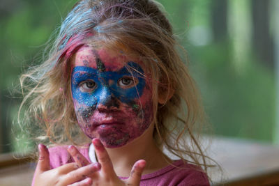 Portrait of girl with face paint