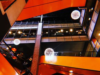 Low angle view of illuminated building at night