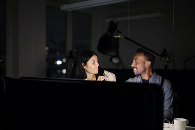 People working late in office