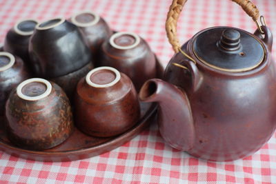 Close-up of crockery on table