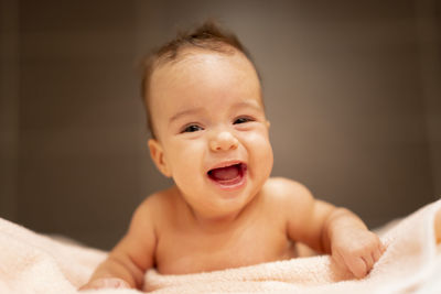 Beautiful happy girl after leaving the bathroom