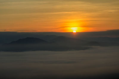 Scenic view of dramatic sky during sunset