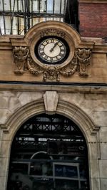 Low angle view of clock