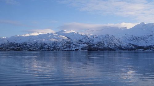 Scenic view of snowcapped mountains against sky