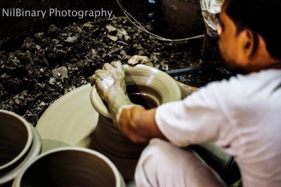 Midsection of man working