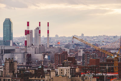 Buildings in city against sky