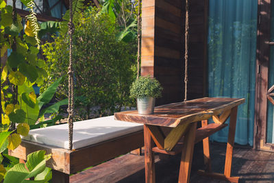 Potted plants on table in yard
