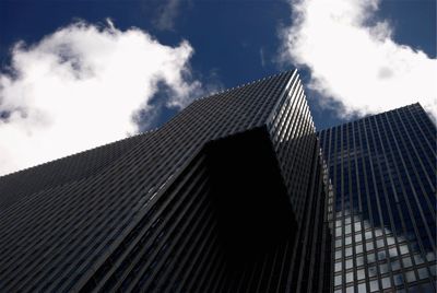 Low angle view of skyscraper against sky