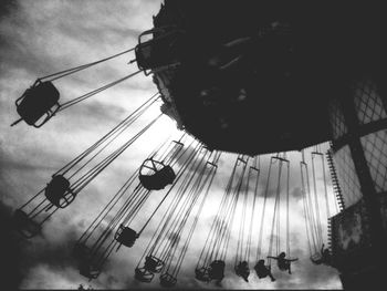 Low angle view of illuminated ferris wheel