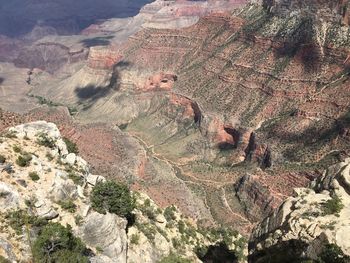 Aerial view of rock formations at grand canyon national park during sunny day