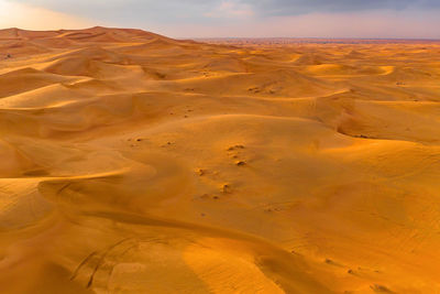 Scenic view of desert against sky