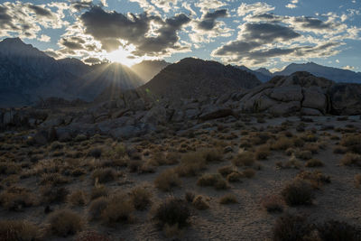 Scenic view of mountains against sky during sunset