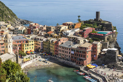 Italy, liguria, vernazza, view of coastal village along cinque terre in summer