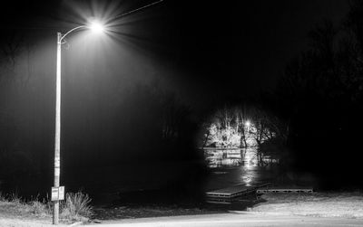 Illuminated street light at night