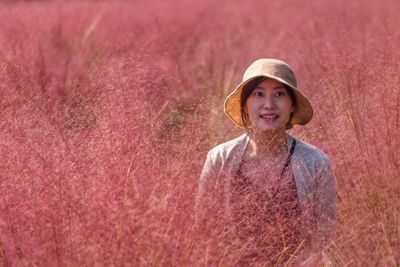 A lady in the pink muhly