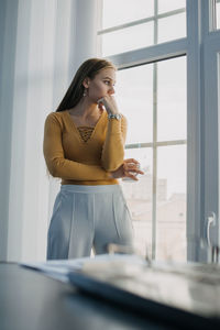 Worker burnout, emotional burnout, mental health problem. tired businesswoman, worker standing by 