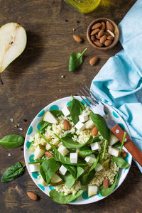 High angle view of chopped vegetables in bowl on table