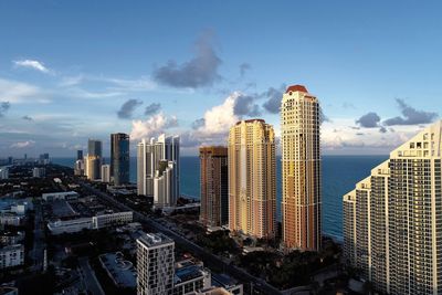 Panoramic view of modern buildings against sky