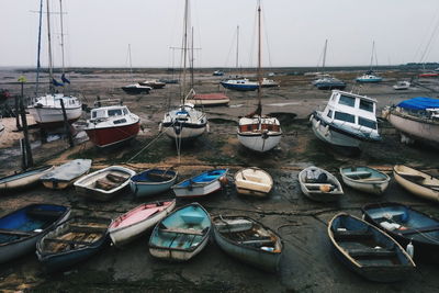 Boats moored at harbor