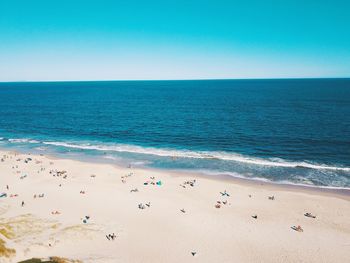 Scenic view of sea against clear blue sky