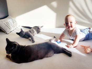 Girl with cat at home