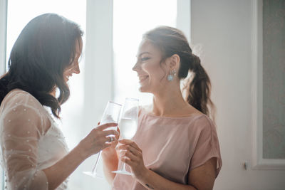 Young woman drinking glass