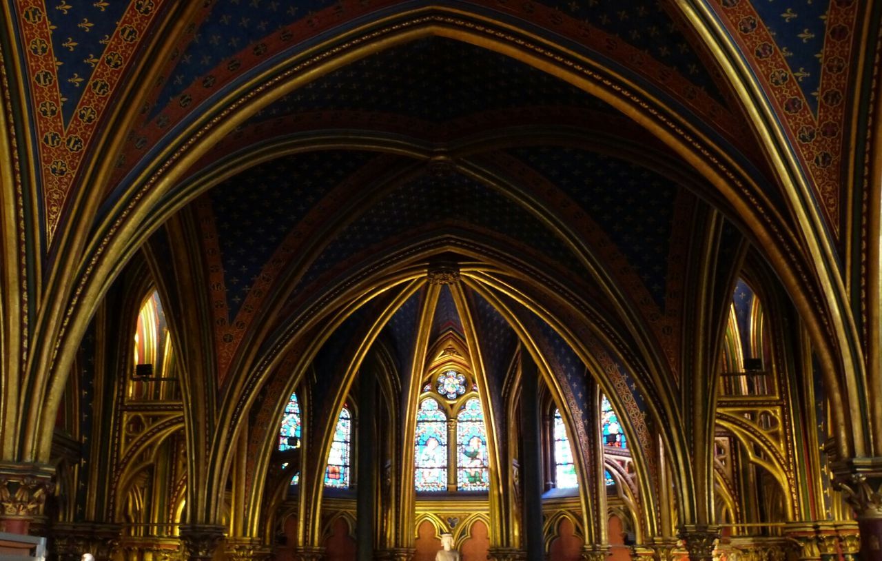 indoors, arch, place of worship, religion, architecture, church, spirituality, built structure, interior, ceiling, low angle view, architectural column, window, architectural feature, ornate, cathedral, history, no people