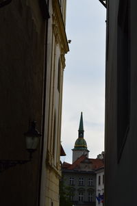 Low angle view of buildings in city against sky