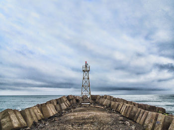 Pier over sea against sky