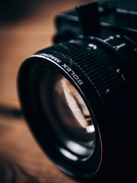 Close-up of camera on table