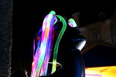 Close-up of multi colored lights against black background