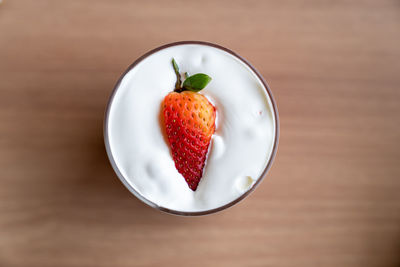 High angle view of strawberry served in plate on table