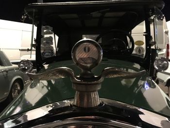 Close-up of vintage car parked